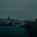city skyline near body of water during daytime