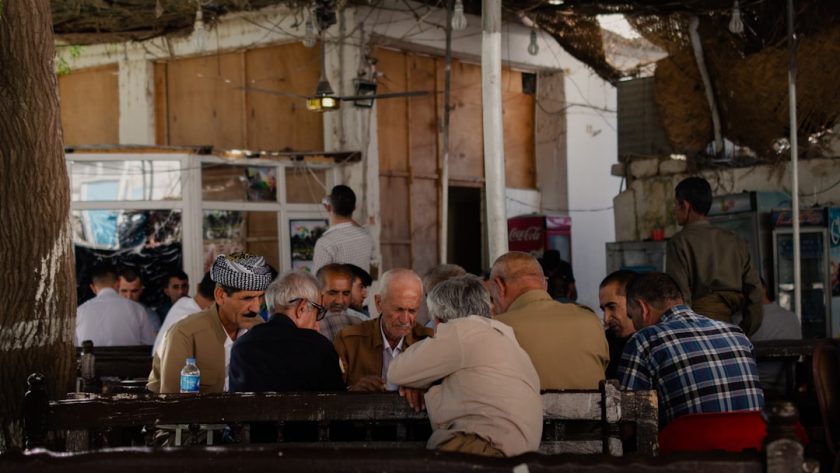a group of people sitting at a table