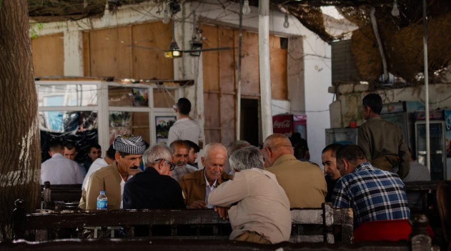 a group of people sitting at a table